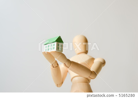 A doll with a small house A doll with a small house 5165280