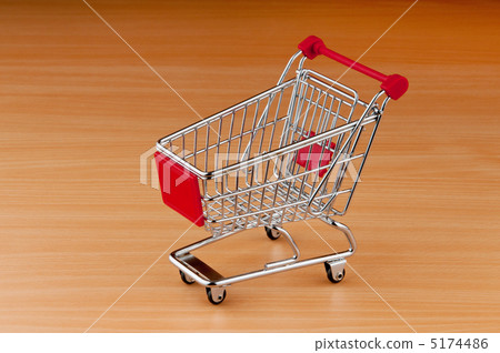 Shopping cart against the  background 5174486