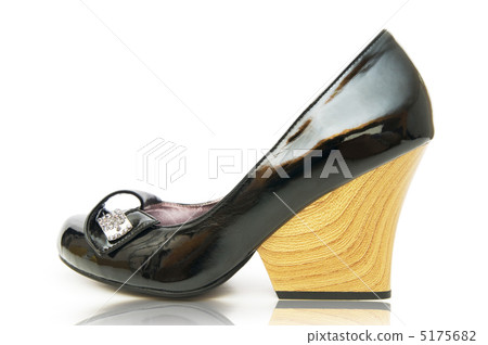 Woman shoes isolated on the white background Woman shoes isolated on the white background 5175682