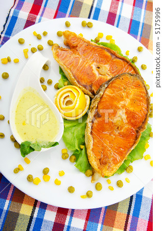 Roasted salmon in the plate 5175996