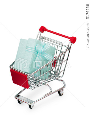 Shopping cart and giftboxes on white Shopping cart and giftboxes on white 5176236