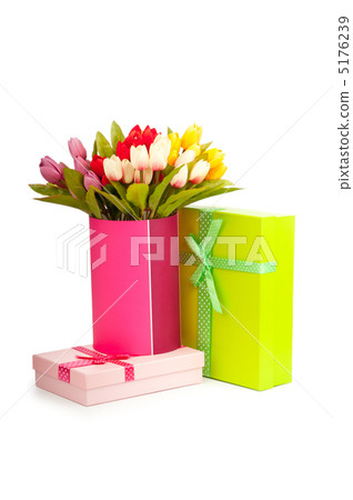 Giftbox and tulips isolated on white Giftbox and tulips isolated on white 5176239