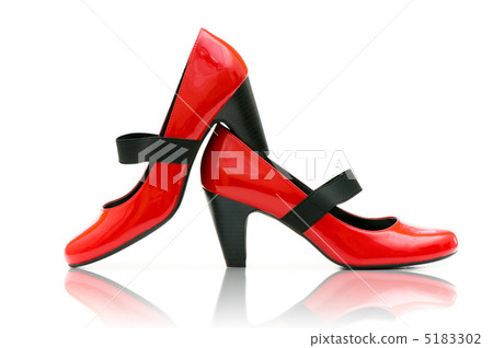 Elegant red shoes on the white 5183302