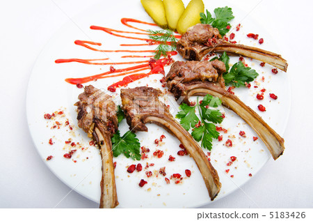 Lamb ribs served in the plate 5183426