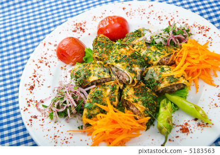 Tasty kebabs served in pita bread 5183563