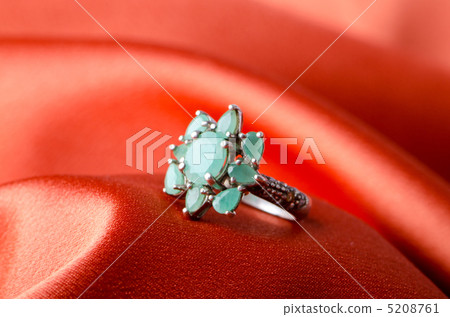 Fashion concept with ring on background Fashion concept with ring on background 5208761