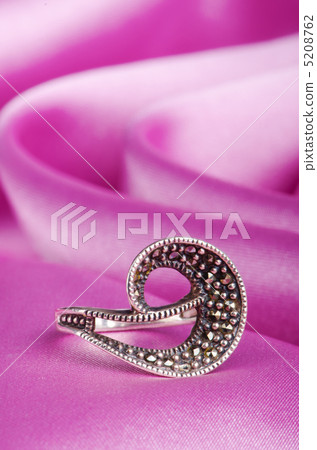 Jewellery ring on the satin background Jewellery ring on the satin background 5208762