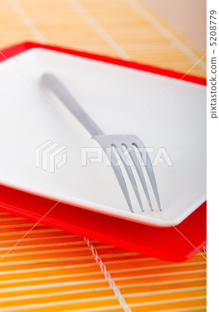 Empty plate with utensils Empty plate with utensils 5208779