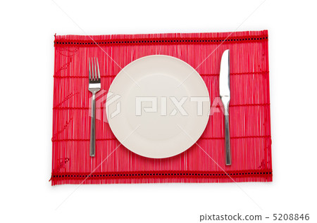 Plate and utensils served on table 5208846