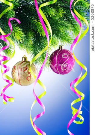 Baubles on christmas tree in celebration concept Baubles on christmas tree in celebration concept 5208876
