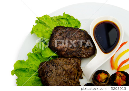 Steak with sauce in the plate Steak with sauce in the plate 5208913