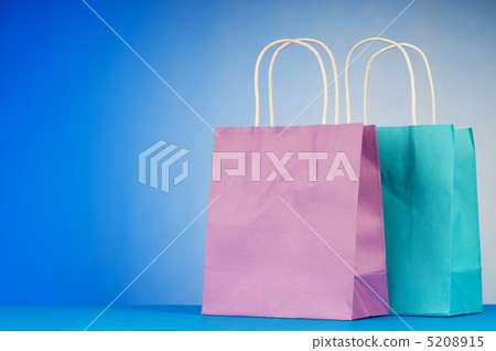 Shopping bags against gradient background Shopping bags against gradient background 5208915