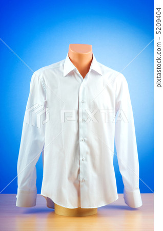 Male shirt against gradient background Male shirt against gradient background 5209404