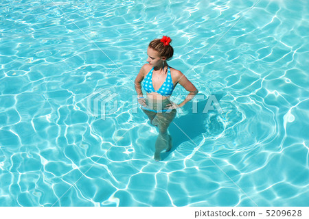 Girl in swimming pool Girl in swimming pool 5209628