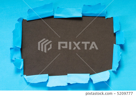 Space for your message on torn paper 5209777