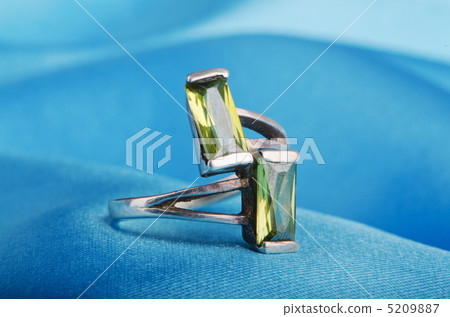 Jewellery ring on the satin background Jewellery ring on the satin background 5209887