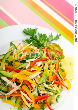 Delicious salad in the plate 5209891