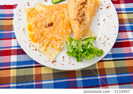 Pumpkin stuffed panckes in the plate 5210407