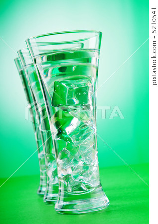 Water in the glass against gradient background Water in the glass against gradient background 5210541