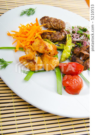 Plate with tasty lamp kebabs Plate with tasty lamp kebabs 5210553