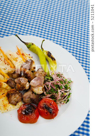 Meat cuisine - kebab served in plate 5211041