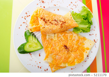 Pumpkin stuffed panckes in the plate 5211170