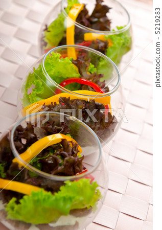 Tasty salad served in glasses 5219283