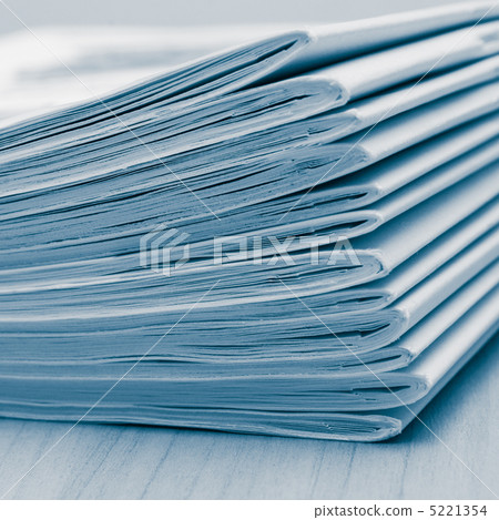Stack of white journals Stack of white journals 5221354