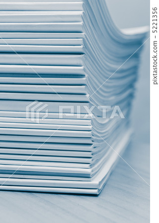 Stack of white journals Stack of white journals 5221356