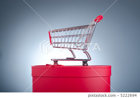 Christmas shopping concept with shopping cart Christmas shopping concept with shopping cart 5222694