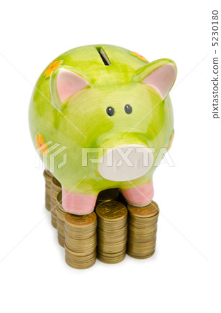 Piggy bank and coins isolated on white Piggy bank and coins isolated on white 5230180