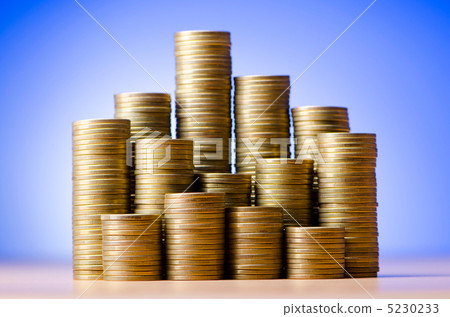 Golden coins in high stacks 5230233