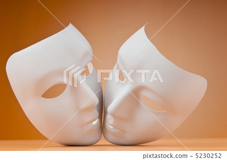 Theatre concept with masks against background Theatre concept with masks against background 5230252