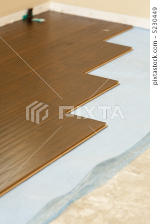 Newly Installed Brown Laminate Flooring Newly Installed Brown Laminate Flooring 5230449