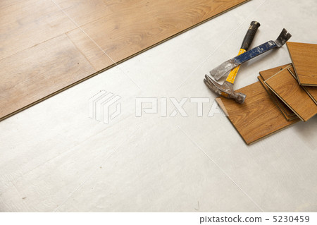 Hammer and Pry Bar with Laminate Flooring Abstract Hammer and Pry Bar with Laminate Flooring Abstract 5230459