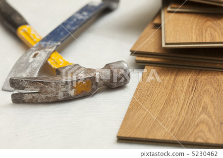 Hammer and Pry Bar with Laminate Flooring Abstract Hammer and Pry Bar with Laminate Flooring Abstract 5230462