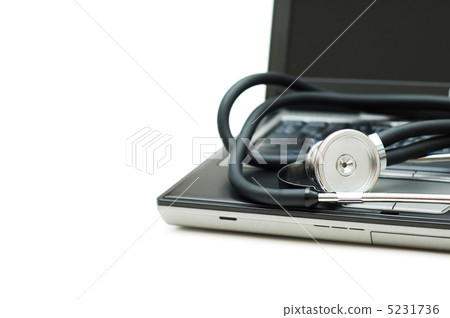 Stethoscope and laptop illustrating concept of digital security 5231736
