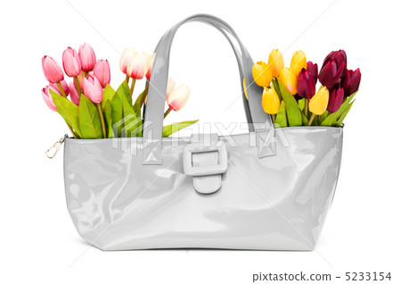 Bag and flowers isolated on the white background 5233154