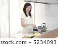 Woman cooking 5234093