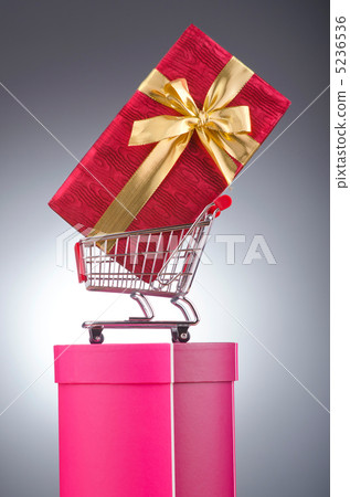 Christmas shopping concept with shopping cart Christmas shopping concept with shopping cart 5236536