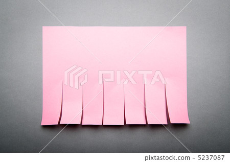 Tear off paper notice on the wall 5237087