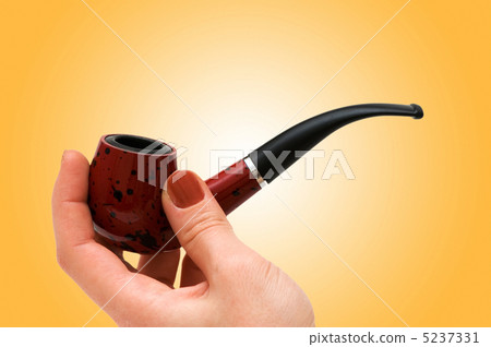 Hand with the smoking pipe Hand with the smoking pipe 5237331
