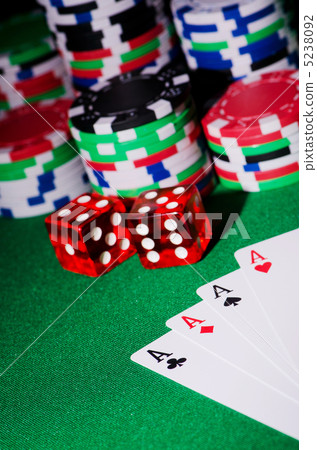 Casino concept with chips and cards Casino concept with chips and cards 5238092