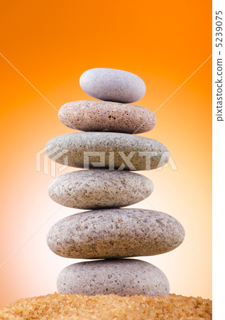 Balanced pebbles with colour background Balanced pebbles with colour background 5239075