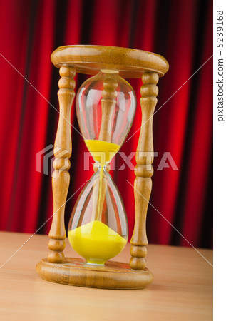 Hour glass in time concept 5239168