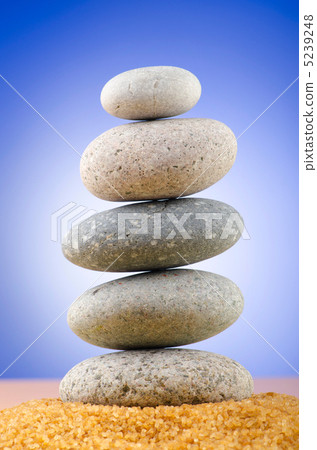 Balanced pebbles with colour background 5239248