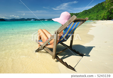 Girl on a beach Girl on a beach 5243139
