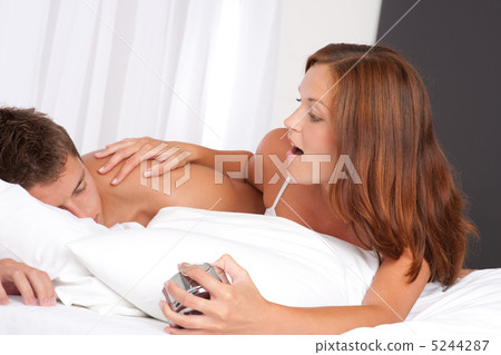 Young woman waking up man Young woman waking up man 5244287