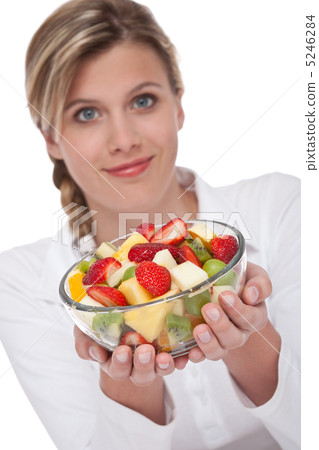 Healthy lifestyle series - Woman holding fruit salad Healthy lifestyle series - Woman holding fruit salad 5246284