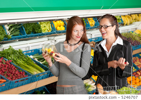 Grocery store shopping - Two business women 5246707